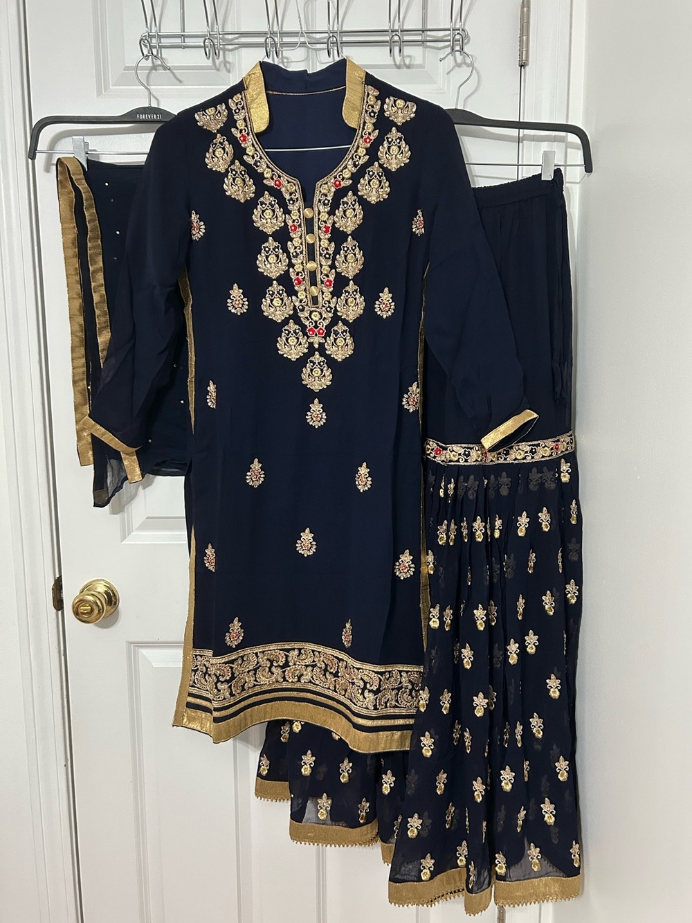 Indian Pakistani 3 piece stitched suit with gharara in dark blue, gold, and red